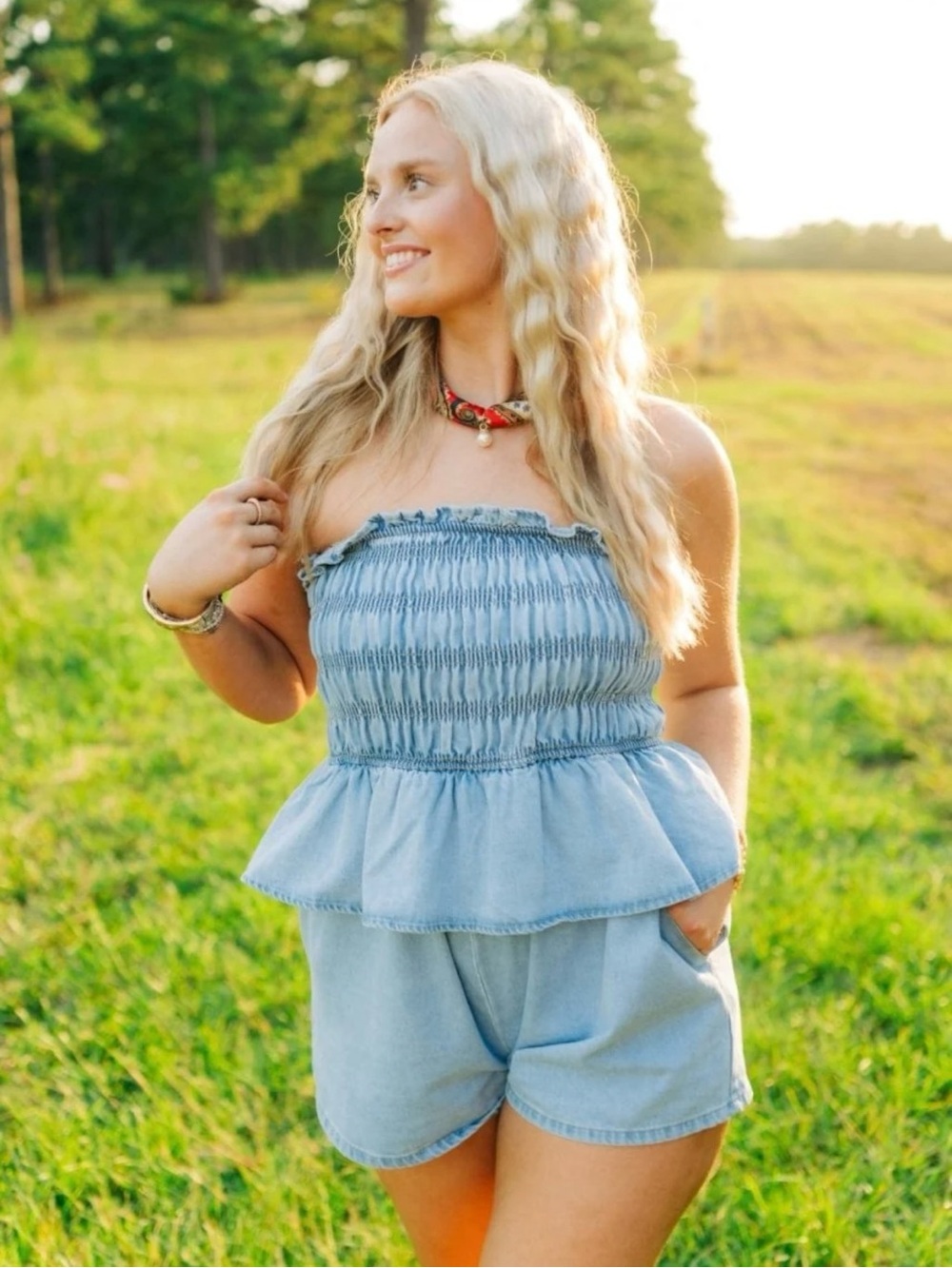 Le Lis Light Blue Smocked Strapless Peplum Romper